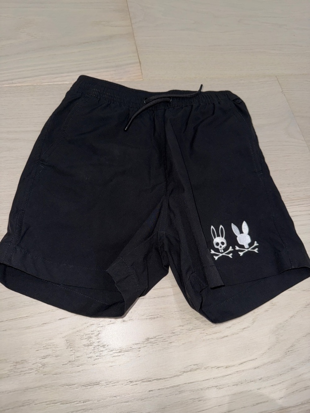 Psycho Bunny Kids Black Swim Trunks with White Bunny Skull Logo